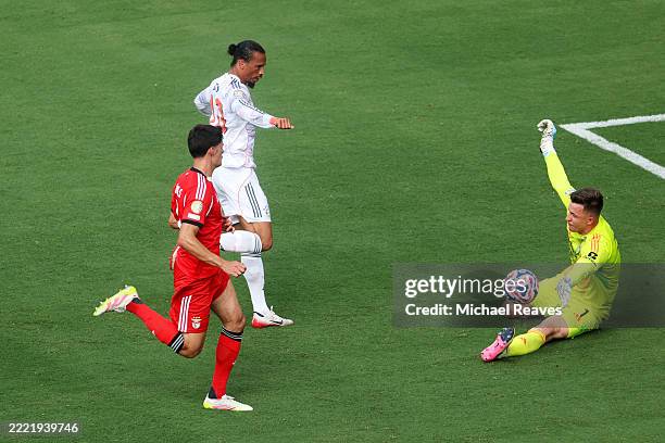 Anatoliy Trubin of SL Benfica makes a save against Leroy Sane of FC Bayern Munchen during the FIFA Club World Cup 2025 group C match between SL...