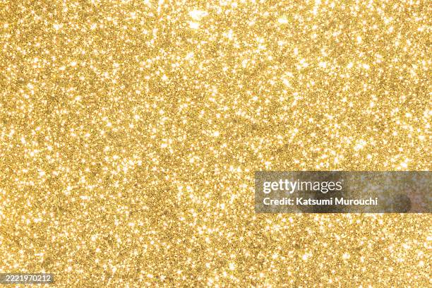 gold glitter texture background - purpurina fotografías e imágenes de stock