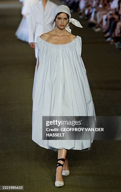 Models present a creation for the Jacquemus Menswear Spring-Summer 2026 collection show as part of the Paris Fashion Week at the Orangery of the...