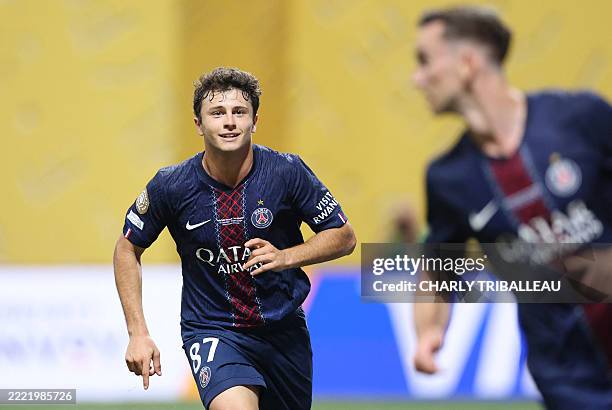 Paris Saint-Germain's Portuguese midfielder Joao Pedro Goncalves Neves celebrates after scoring his second goal during the FIFA Club World Cup 2025...
