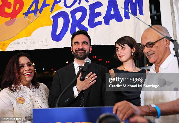 Mira Nair, New York mayoral candidate, State Rep. Zohran Mamdani Rama Duwaji and Mahmood Mamdani celebrate on stage during an election night...