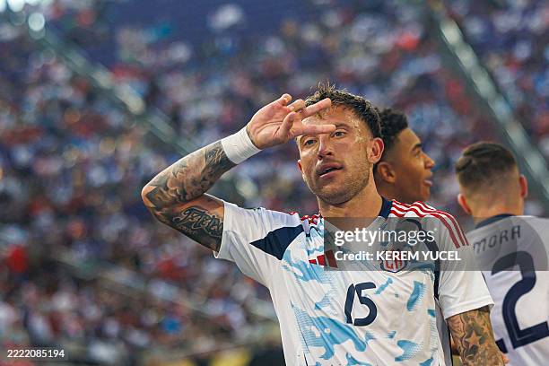 Costa Rica's defender Francisco Calvo celebrates after scoring the early goal from the penalty spot during the CONCACAF Gold Cup quartefinal match...