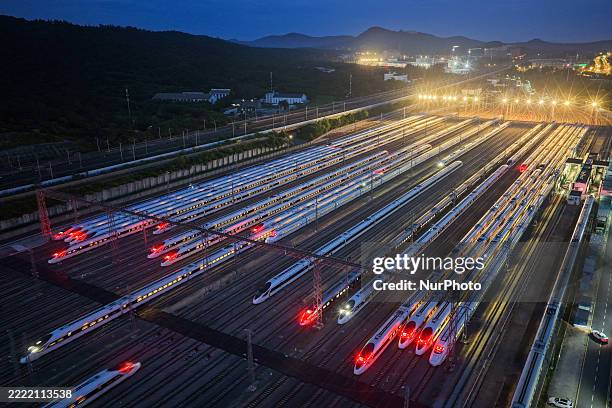 Trains park at the Nanjing South EMU Depot in Nanjing, Jiangsu Province, China, on June 30 in the early morning.