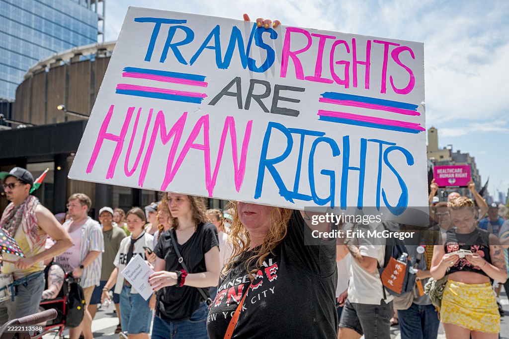 Thousands March In Participant seen holding a sign at the march. Thousands of New... News ...