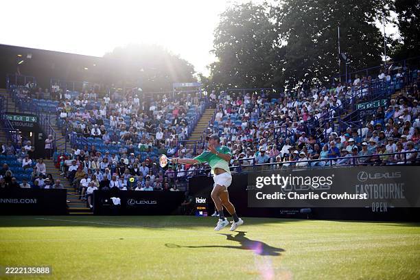 Tommy Paul of United States plays a forehand against Dan Evans of Great Britain during the Men's Second Round match on Day Three of the Lexus...