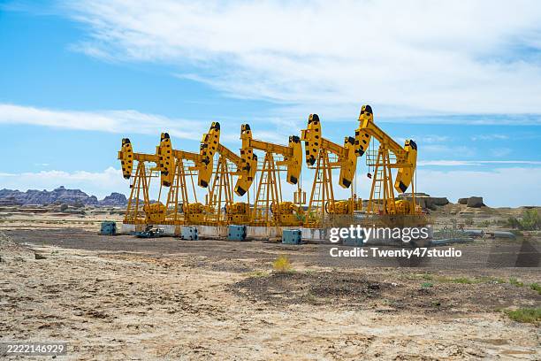 oil rig in the xinjiang region, northwest china - pipeline wave stock pictures, royalty-free photos & images