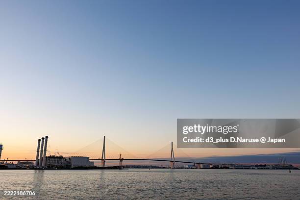 the first sunrise and tsurumi-tsubasa bridge. - tsubasa stock pictures, royalty-free photos & images