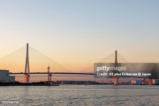 the first sunrise and tsurumi-tsubasa bridge. - tsubasa stock pictures, royalty-free photos & images