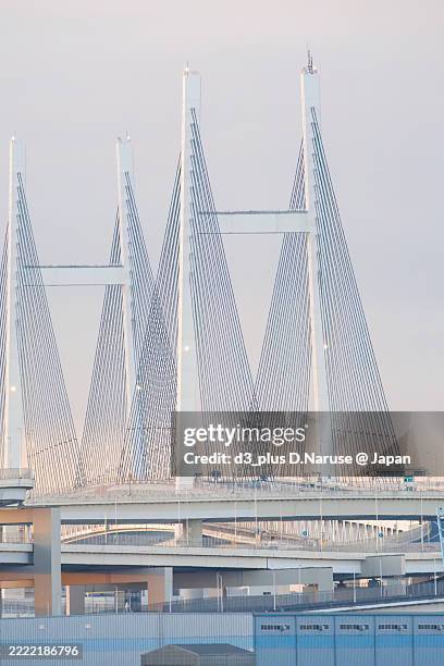 the first sunrise and tsurumi-tsubasa bridge. - tsubasa stock pictures, royalty-free photos & images