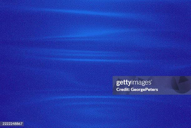 softness, flowing spot lit grainy background - brushed metal surface stock illustrations