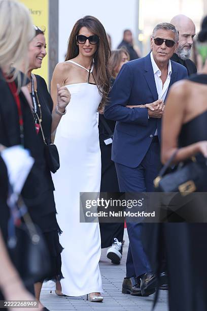 George Clooney and Amal Clooney arrive for The King's Trust and TKMaxx & Homesense Awards 2025 at The Royal Festival Hall on June 26, 2025 in London,...