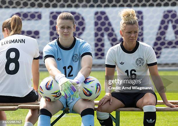 Goalkeeper Stina Johannes and Linda Dallmann of Germany's National Women's team wait for a team photo ahead of the UEFA Women's EURO 2025 on July 1,...