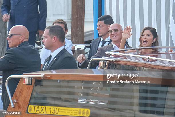 Jeff Bezos and Lauren Sanchez leave the Aman Hotel to go to dinner with guests ahead of their wedding, on June 26, 2025 in Venice, Italy.