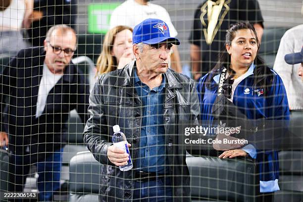 Actor Eugene Levy stands behind home plate ahead of of the MLB game between the Toronto Blue Jays and the Athletics at Rogers Centre on May 31, 2025...