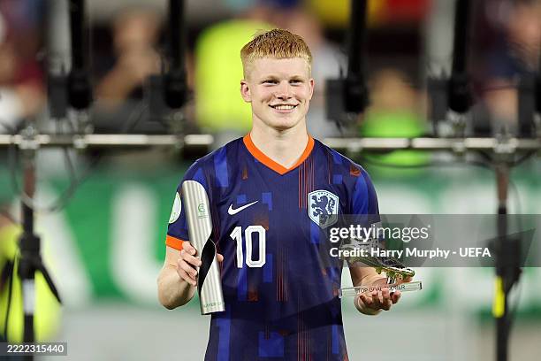 Kees Smit of Netherlands poses for a photo with his UEFA player of the tournament and top goal scorer awards following victory in the UEFA European...