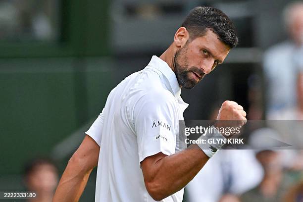 Serbia's Novak Djokovic reacts as he plays against France's Alexandre Muller during their men's singles first round tennis match on the second day of...