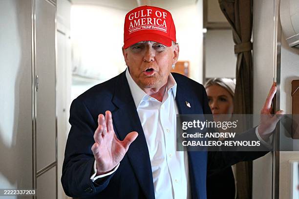 President Donald Trump speaks with the press on board Air Force One as he travels from Ochopee, Florida to Joint Base Andrews, Maryland on July 1,...