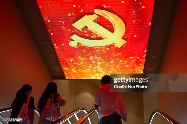 Large flag is projected on the ceiling inside the Memorial of the First National Congress of the Communist Party of China in Shanghai, China, on July...