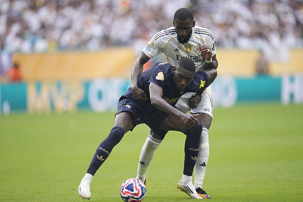 Randal Kolo Muani centre-forward of Juventus and France and Antonio Rudiger centre-back of Real Madrid and Germany compete for the ball during the...