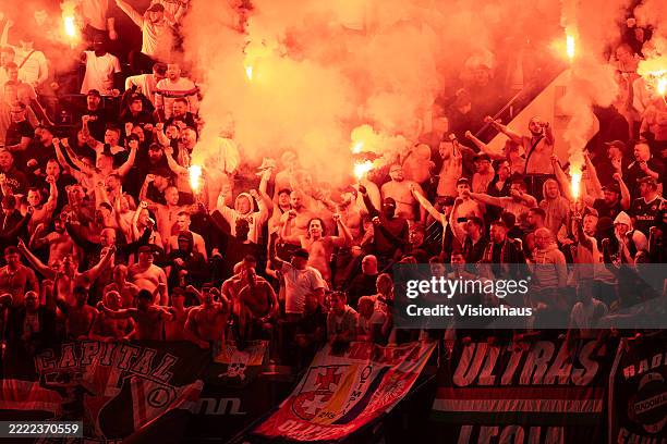 Legia Warsaw fans set off pyrotechnics during the UEFA Conference League 2024/25 Quarter Final Second Leg match between Chelsea FC and Legia Warszawa...