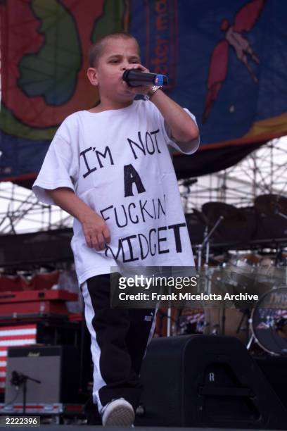 Kid Rock rapper and sideman Joe C performs on the east stage Saturday at Woodstock '99 in Rome, New York at Griffiss AFB Park for the 30th...