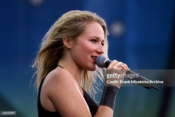 Jewel performs on the east stage at Woodstock '99 in Rome, New York at Griffiss AFB Park for the 30th Anniversary Concert. She is among over 45 bands...