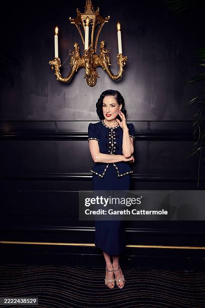 Dita Von Teese poses during a portrait session for Dita Von Teese's "Diamonds And Dust" inside the Beaufort Bar at The Savoy Hotel on June 26, 2025...
