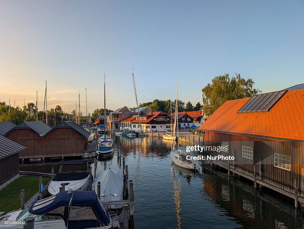 Boats Moored At A Small Sailing Boat Harbor