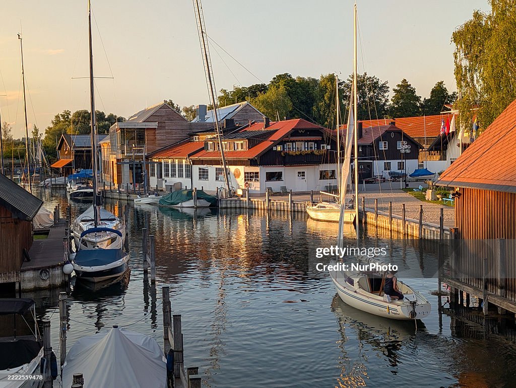 Boats Moored At A Small Sailing Boat Harbor