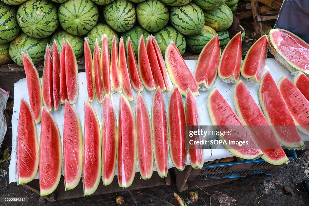 Kaffer Watermelon A display of sliced watermelons for sale at a market in Nakuru.... News ...