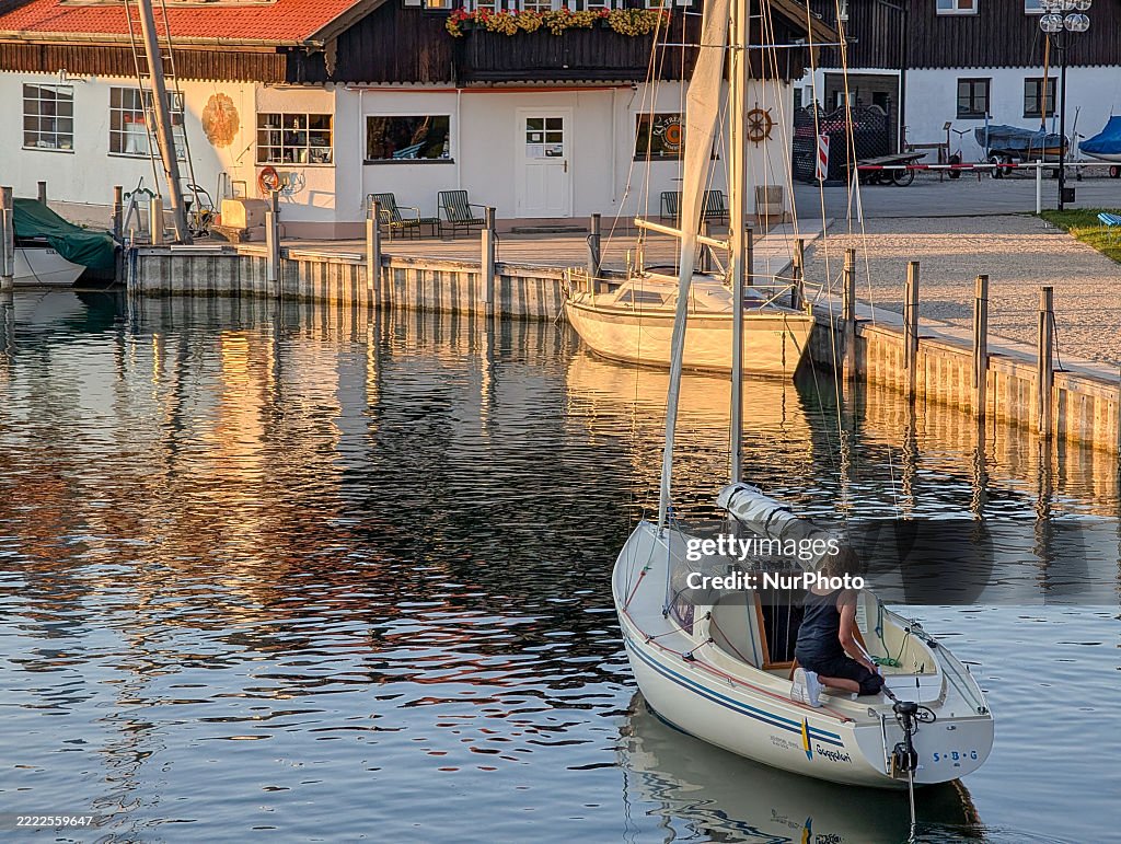 Boats Moored At A Small Sailing Boat Harbor