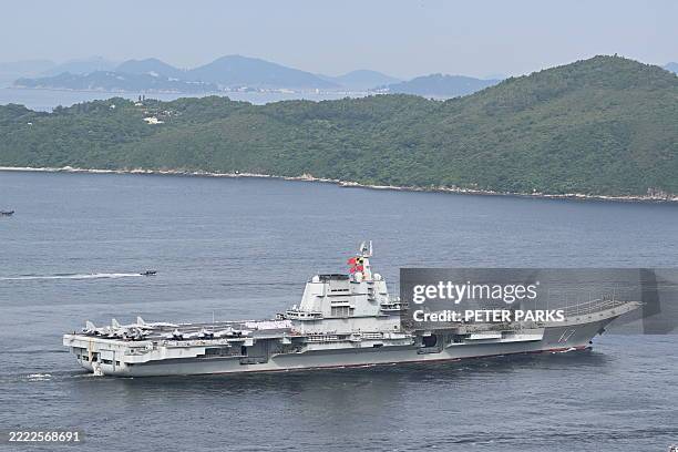 China's first domestically built aircraft carrier Shandong sails into Hong Kong waters on July 3, 2025. Commissioned in 2019, the 305-metre-long...