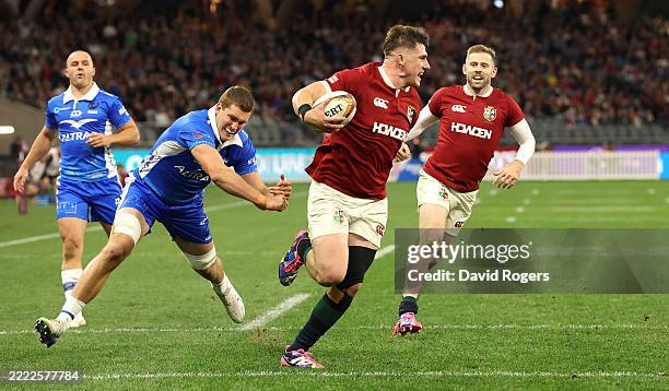 Dan Sheehan of the British & Irish Lions breaks clear to score their first try during the tour match between the Western Force and British & Irish...