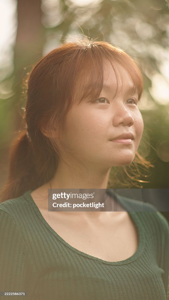 Teenager relaxing with sunlight.