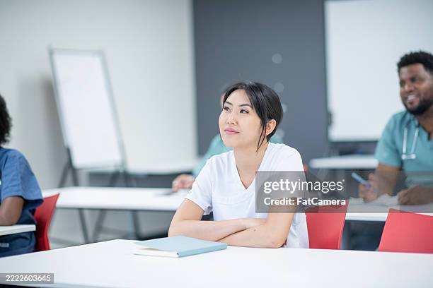 medical students in classroom during training or seminar session - vocational education stock pictures, royalty-free photos & images