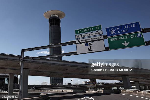 Picture taken on July 3, 2025 shows the air traffic control tower of Roissy Charles-de-Gaulle airport, outside Paris, as French air traffic...