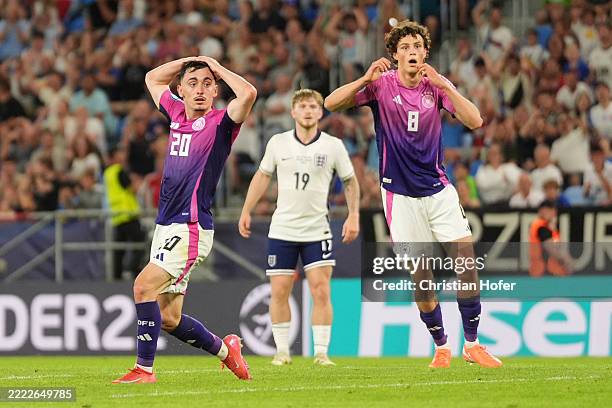Paul Nebel and Merlin Roehl of Germany react after a missed chance during the UEFA European Under-21 Championship 2025 Final match between England...