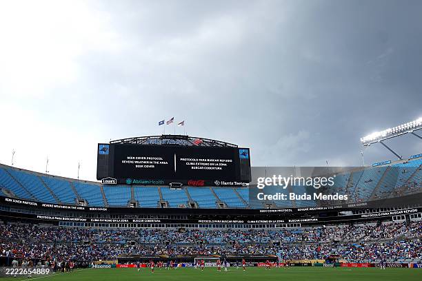 The giant screen informs on weather delay during the FIFA Club World Cup 2025 round of 16 match between SL Benfica and Chelsea FC at Bank of America...
