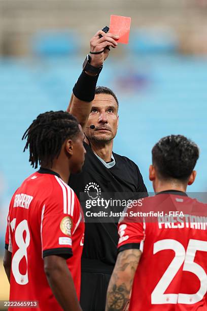Gianluca Prestianni of SL Benfica is shown a red card by referee Slavko Vincici during the FIFA Club World Cup 2025 round of 16 match between SL...