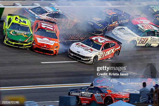 Austin Cindric, driver of the Menards/Quaker State Ford, Denny Hamlin, driver of the King's Hawaiian Toyota, Josh Berry, driver of the DEX Imaging...