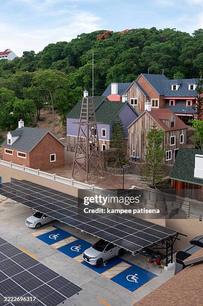 a parking lot with a solar panel on top of it - belarus stock pictures, royalty-free photos & images