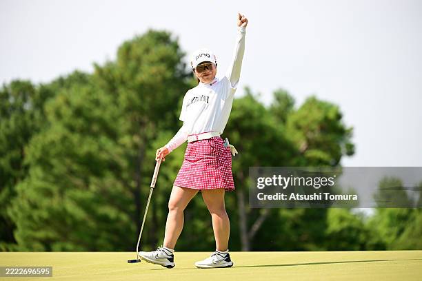 Shuri Sakuma of Japan celebrates winning the tournament on the 18th green during the final round of Earth Mondahmin Cup at Camellia Hills Country...