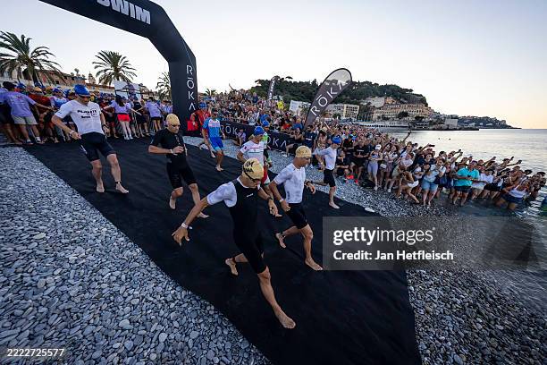 Athletes compete in the swim leg during the 2025 IRONMAN 70.3 Nice on June 29, 2025 in Nice, France.