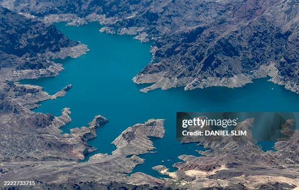 Aerial view of Boulder Basin, the northwestern arm of Lake Mead, shows the bathtub ring, indicator of long-term water loss, between Boulder City,...