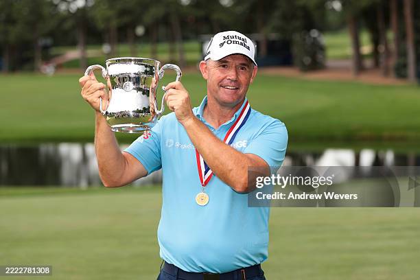 Padraig Harrington of Ireland poses for a photo with the Francis D. Ouimet Memorial Trophy after winning the U.S. Senior Open Championship 2025 at...