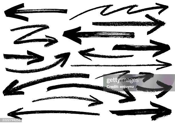 hand drawn black chalk or crayon arrows - squiggle arrow stock illustrations