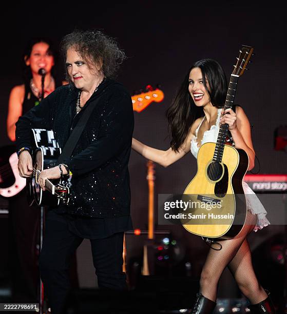 Olivia Rodrigo performs with Robert Smith of The Cure on the Pyramid stage during day five of Glastonbury festival 2025 at Worthy Farm, Pilton on...