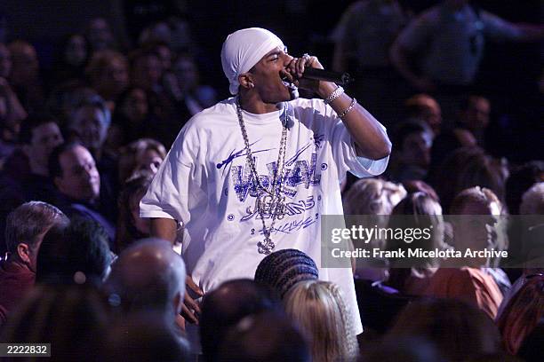 Nelly jumps into the audience at the 2000 Radio Music Awards at the Aladdin Hotel in Las Vegas, Nevada, Saturday November 4, 2000.