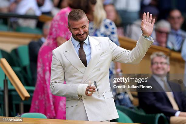 Sir David Beckham arrives in the Royal Box prior to the Gentlemen's Singles first round match between Fabio Fognini of Italy and Carlos Alcaraz of...
