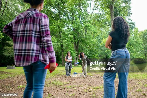 corn hole toss - corn hole stock pictures, royalty-free photos & images